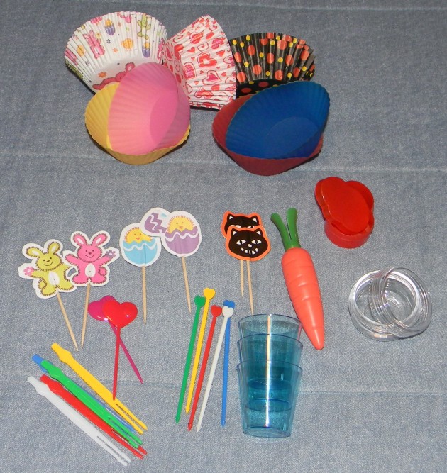 We have: some picks, some cups, a couple of sauce containers, silicone and paper side-dish cups.